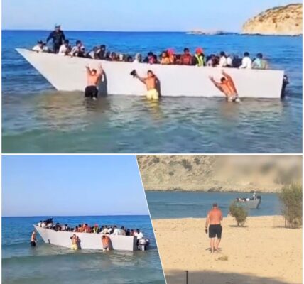 VIDEO: Toeristen op het Griekse eiland Gavdos duwen een boot vol met vluchtelingen die daar aan land proberen te komen weer terug de zee in!