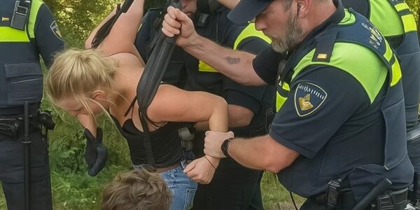 VIDEO: Klimaatactivist wordt hardhandig aangepakt door twee politieagenten
